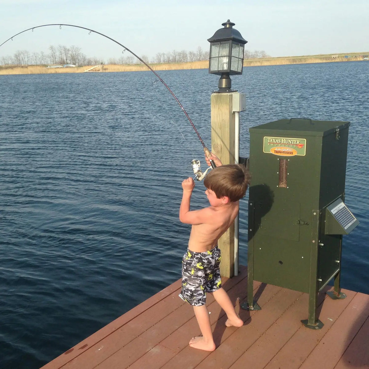 Texas Hunter Fish Feeder WITH Solar Panel- 70 lb. Fish Feed, 125 lb. Corn Capacity – with Straight Legs
